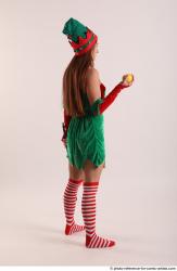 Veronika Elf Pose With Apple